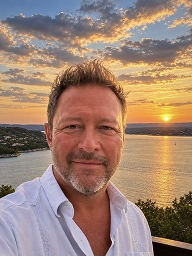 Rick Olivo at sunset above Lake Travis